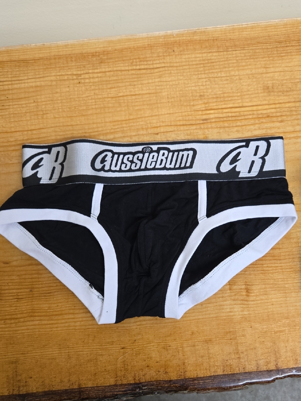 New No packaging.  AussieBum Men’s Black Briefs with White Trim - Logo Waistband